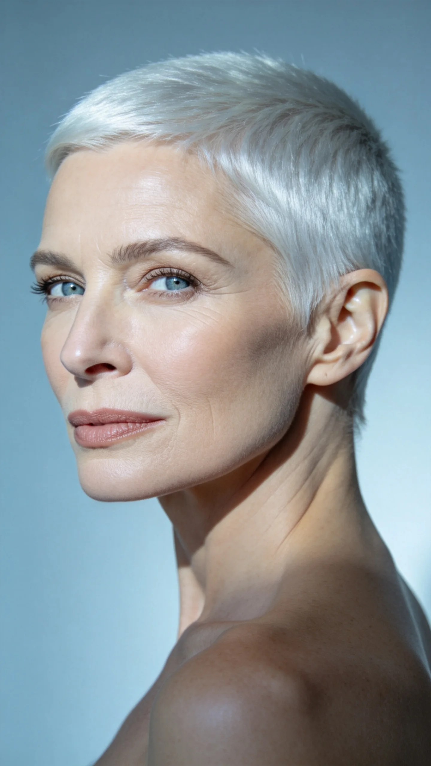 19. All-Over Platinum Buzz Cut With Natural Gray Grow-Out