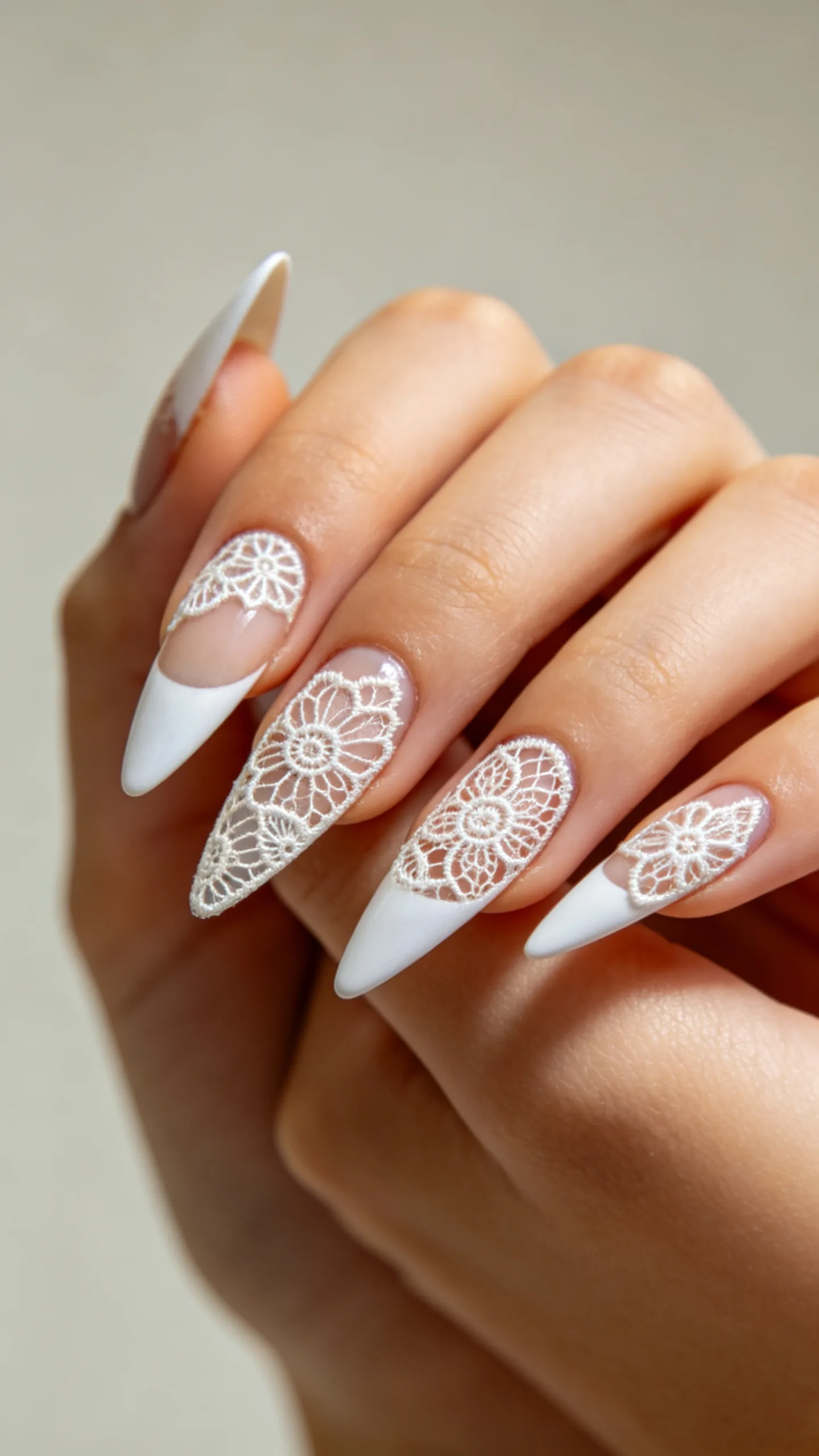 6. Delicate Lace Accent on Stiletto Nails
